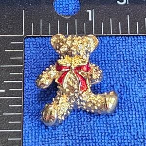 Vintage Gerry’s Textured Gold-Tone Teddy Bear Pin with Red Enamel Bow.